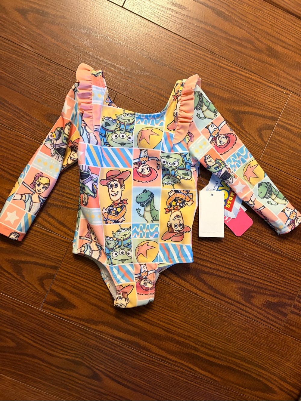 Kids Long-Sleeve One-Piece Swimsuit - Multicolor Toy Print 18mth